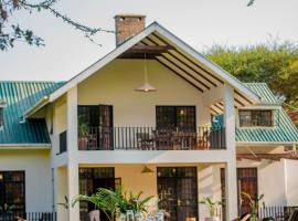 Amani Farmhouse & Cottages: Usa River şehrinde bir otel