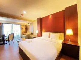 Fancy and Nice Studio at El Royale Apartment By Travelio