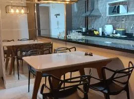 Excelente apartamento com vaga garagem a 50 metros da orla da Praia do Morro Guarapari
