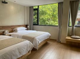 Xinping에 위치한 호텔 行歌坐月