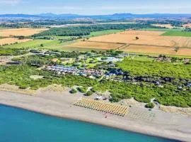 Village with swimming-pool in Montalto Marina just 100 meters from the beach, mobile homes with air conditioning and private outdoor area