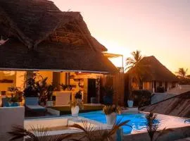 Luxury Penthouse with private rooftop pool prime location Paje Beach Zanzibar TV WIFI AC steps to the beach