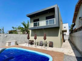 Bertihouse - Apartamentos com piscina perto da praia, Hotel in Bertioga