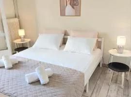 Double bed in a room 5' from metro