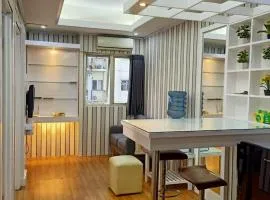 Apartement The Suites Metro by Pinkish