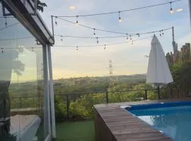 Glass Cabin Secluded Overlooking Oasis with pool
