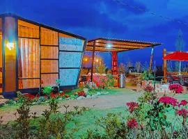 La Tata cabaña y zona de camping