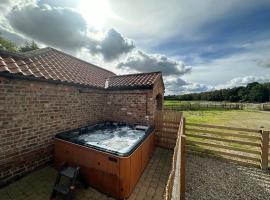 Granary cottage with HOT TUB, hotel v destinaci York