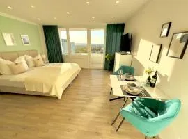 M&D Apartments nähe Stadion mit Klimaanlage - Netflix - Küche - Sunset View - Balkon