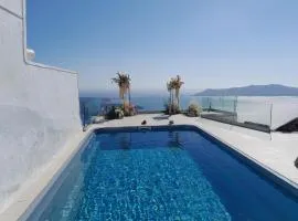 SPILIOTICA HOSPITALITY Cave Traditional House on the cliff with shared pool