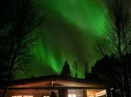Hillavilla in the shore of lake Inari