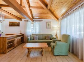 La Mansarda di nonna Delfa، فندق في بينزولو