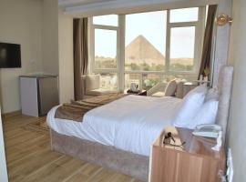 Pyramids Wonders Hotel, hotel en Giza