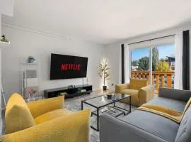 Spacious 4-Bedroom Retreat Near Bow River with Foosball, Dart Board, Movie Room