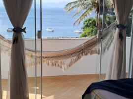 Suítes Encanto do Pai, place to stay in Praia de Araçatiba