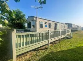 Wonderful 6 Berth Caravan With Decking & River Views At Heacham Beach Ref 21003A