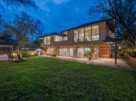 SaffronStays Red Brick House, Panchgani - rustic villa with huge lawn and terrace