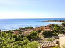 Village in Porto Corallo just 200 meters from the beach, apartments with private outdoor area