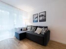 Kosmonautów Comfort Apartment by BookingHost