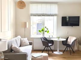 ZUHAUSE AM MEER mit Sonnenbalkon in Strand- und Altstadtnähe, отель в Варнемюнде