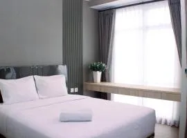 Modern Look and Restful Studio at 32th Floor Vasanta Innopark Apartment By Travelio