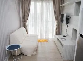Comfy 1BR Apartment at Casa De Parco By Travelio
