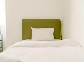 Minimalist and Best Price Studio Apartment at Aeropolis Residence By Travelio