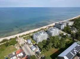 Jantaris Apartments near Beach with Fitness by Noclegi Renters