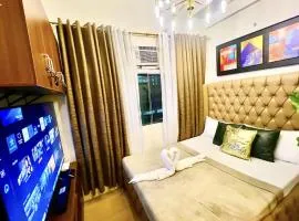 300 Mbps WiFi - 55 inch SMART TV - Alabang condo near Bellevue Hotel Filinvest City
