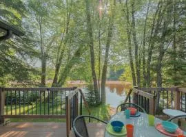 Riverfront Getaway with Hot Tub and Scenic Views