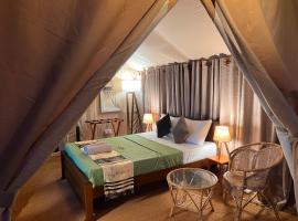 AT ONE - with Nature Glamping Resort, luxusní stan v destinaci Rekawa
