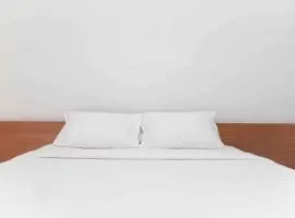 Warm and Cozy Studio Patraland Urbano Apartment By Travelio