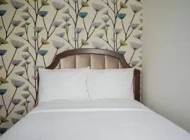 Affordable Studio No Kitchen Apartment at Aeropolis Residence near Soetta By Travelio