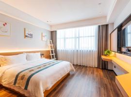 Xiamen Aizhu Business Hotel, hotel v destinaci Kao-ch'i