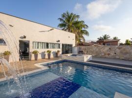 Casa Morada Da Praia, Paraiso em Bertioga - Condomínio à beira mar, khách sạn ở Bertioga