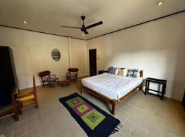 A bedroom in a local area, appartement in Luang Prabang