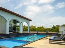 Botanica 1BHK Modern Apartments 10 mins from Candolim beach With Pool & Gym & Wifi & Kitchen & Security
