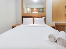 Minimalist and Homey Studio at Amartha View Apartment By Travelio