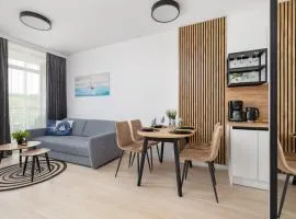 Nadmorski Apartament z Parkingiem by Rent like home