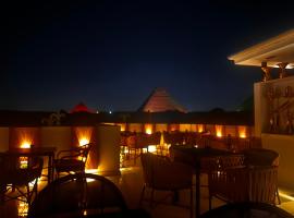 Pyramids On The Spot View, hotel di Kaherah