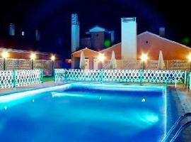 Hotel Puerta de Monfrague, hotel v destinácii Malpartida de Plasencia