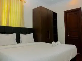 Modern 2BR at The Belleza Apartment By Travelio