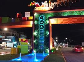 KITNET BERTIOGA CENTRO - TV, WIFI, Garagem, khách sạn ở Bertioga