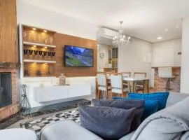 Loft central para família by Achei Gramado