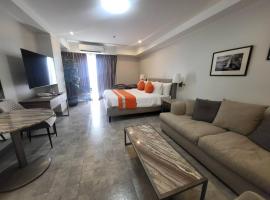 Sheryll Escapes - 1109, Phase 2 La Grande, breezy, hotel amenities!, hotel con alberca en &Aacute;ngeles