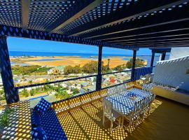 K3 triplex vue sur Mer avec trois piscines, hotel in Oualidia