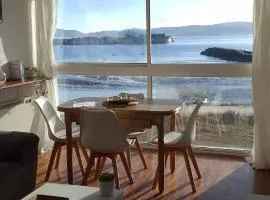 Piso primera línea de playa y vistas al mar en Cariño