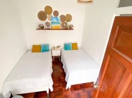 2 beds with garden view and terrace