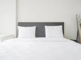 Nice and Homey 1BR at Gold Coast Apartment By Travelio