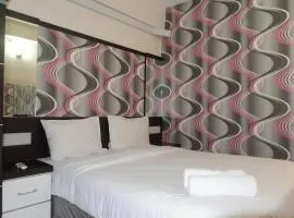 Minimalist 2BR Apartment at Dian Regency By Travelio